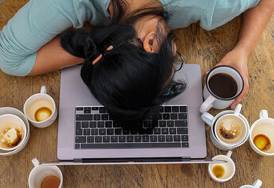 Woman Asleep on Computer